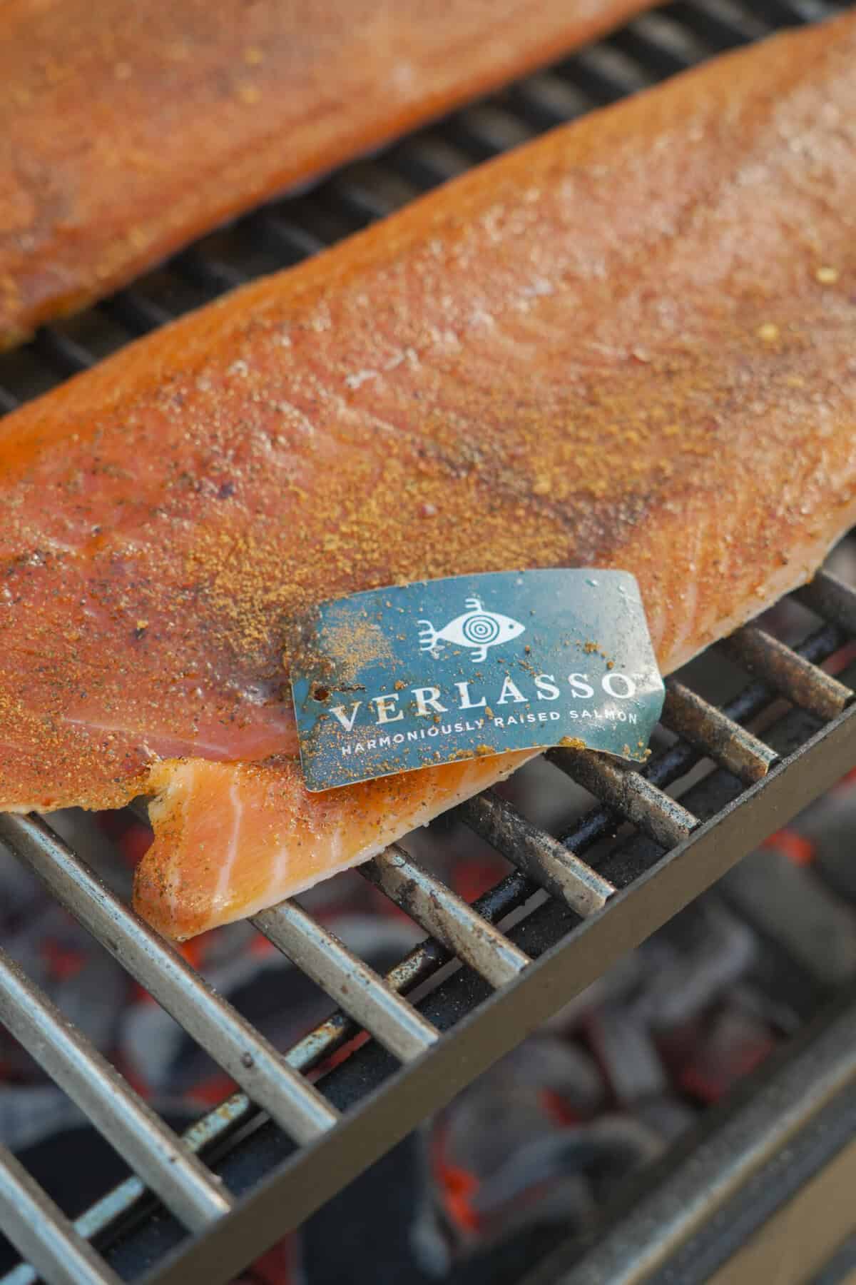 A close up of Verlasso branding on a piece of fish