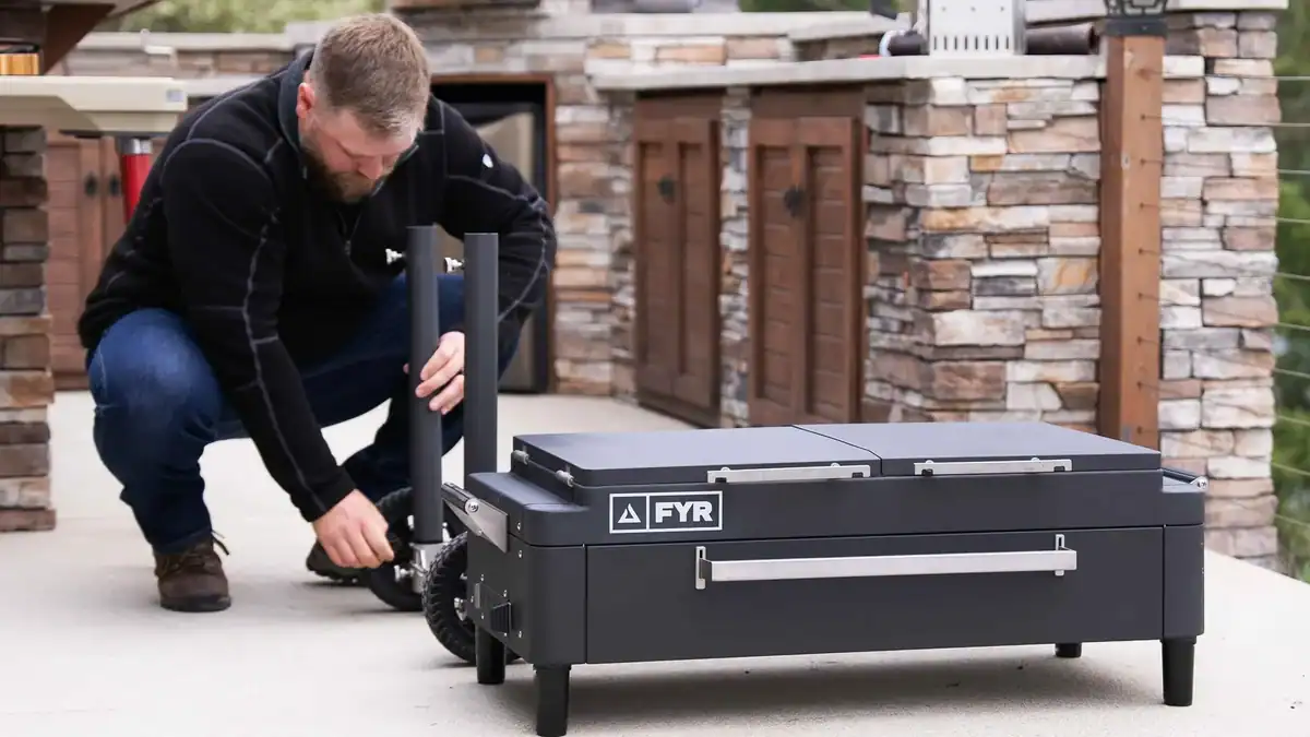 Derek gets ready to assemble the FYR Grill, the portable, versatile, and solid grill created by chefs for backyard cooks.
