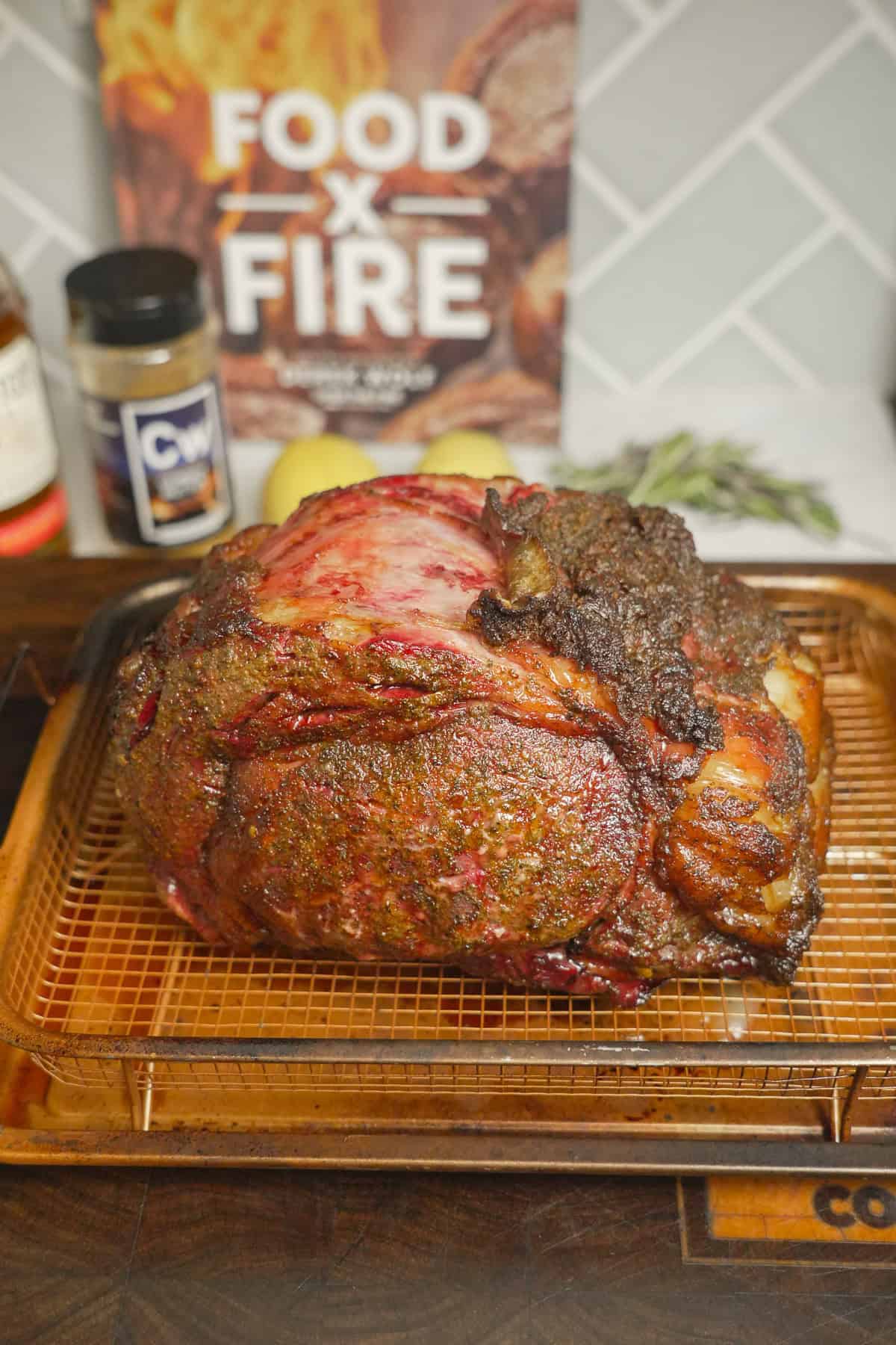 The fully seasoned whisky injected prime rib is done and ready to carve .