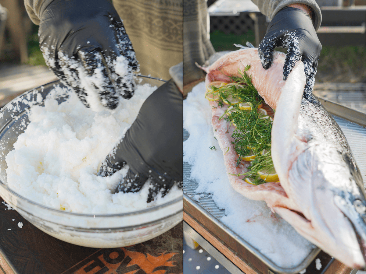 The salt mixture is created and the large salmon is stuffed.