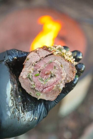 The spiral tenderloin sliced shows off the juicy, tender beef and the herb stuffing.