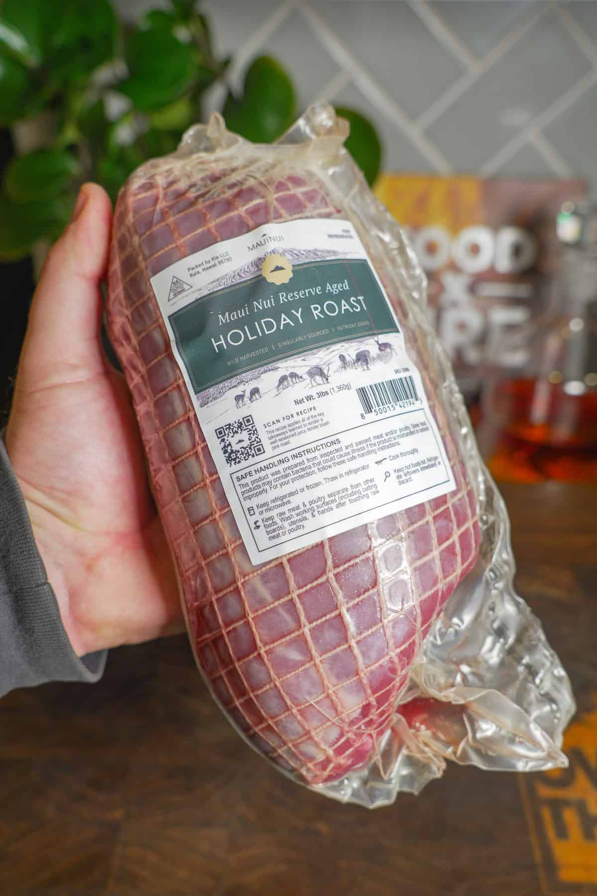 The photo shows how the Maui Nui venison holiday roast come, wrapped in a netting.