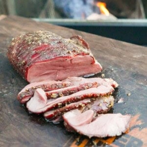 The Maple Bourbon Cured Venision is looking beautiful on the cutting board, sliced and pink inside.