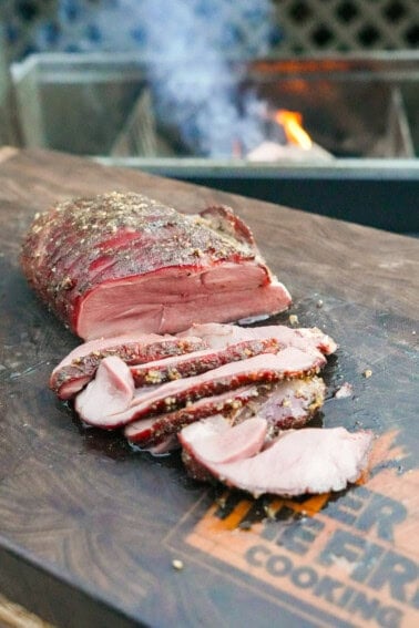 The Maple Bourbon Cured Venision is looking beautiful on the cutting board, sliced and pink inside.