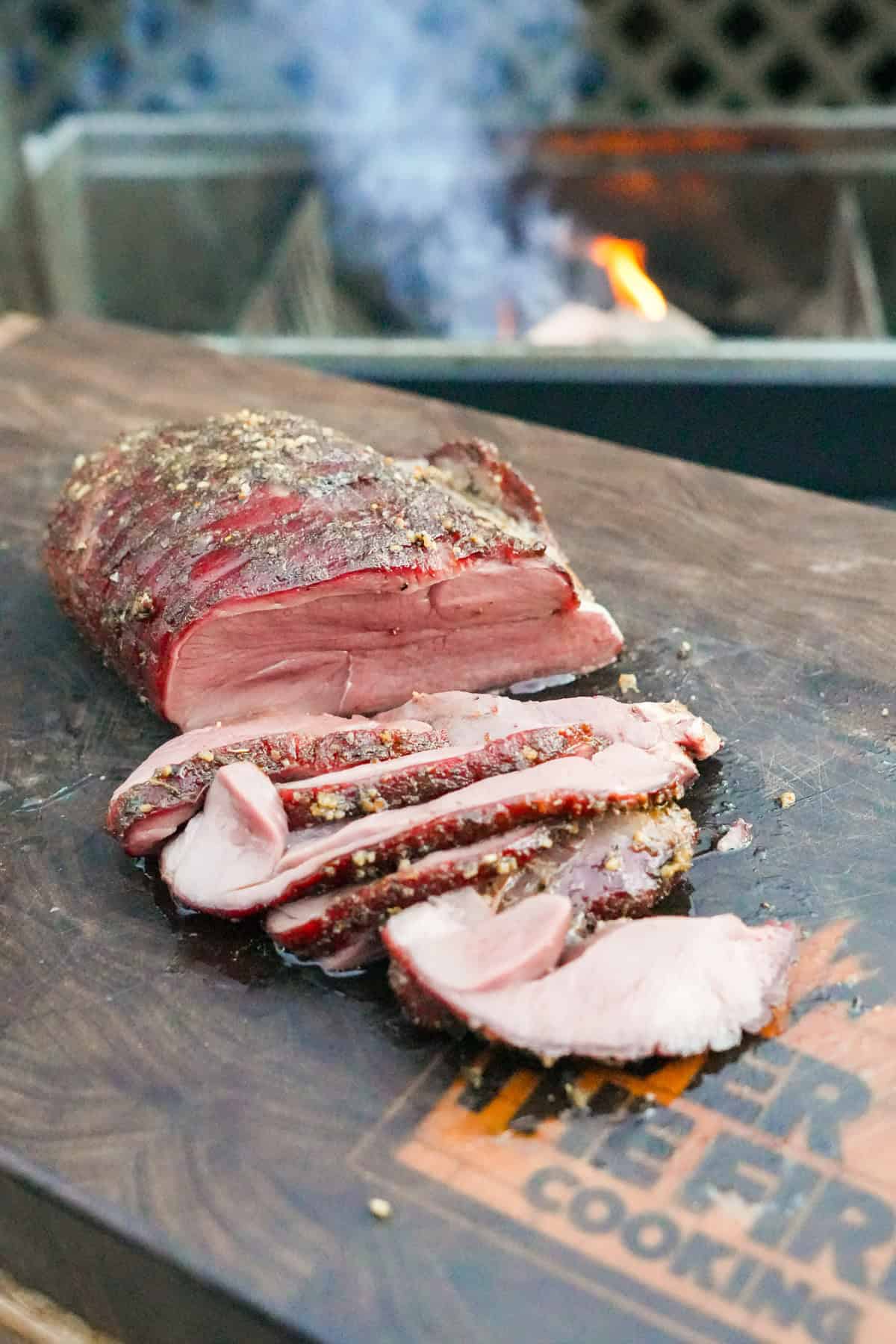 The Maple Bourbon Cured Venision is looking beautiful on the cutting board, sliced and pink inside.