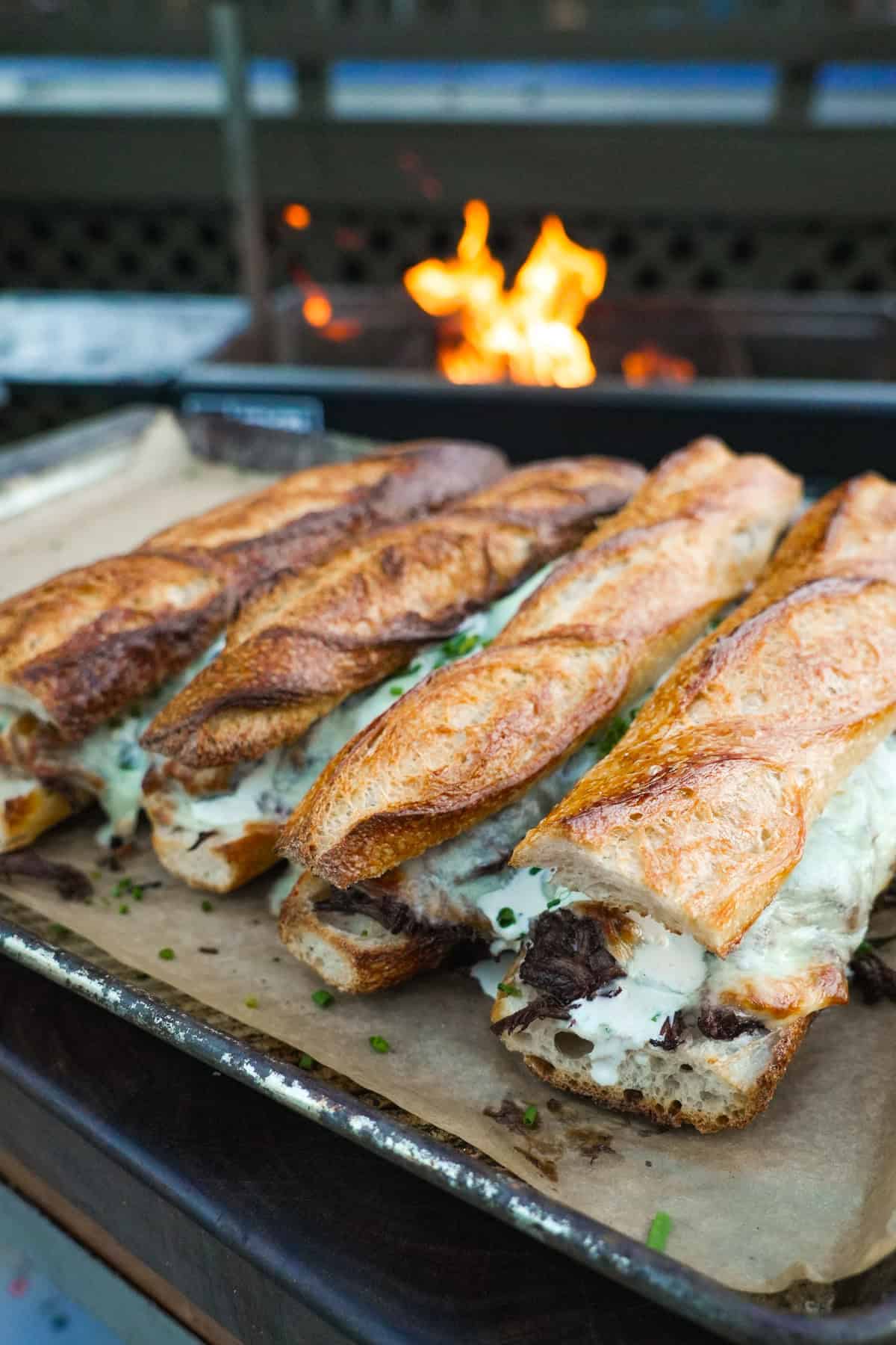 Delicious cheesy French dip sandwiches with melted cheese and tender beef.