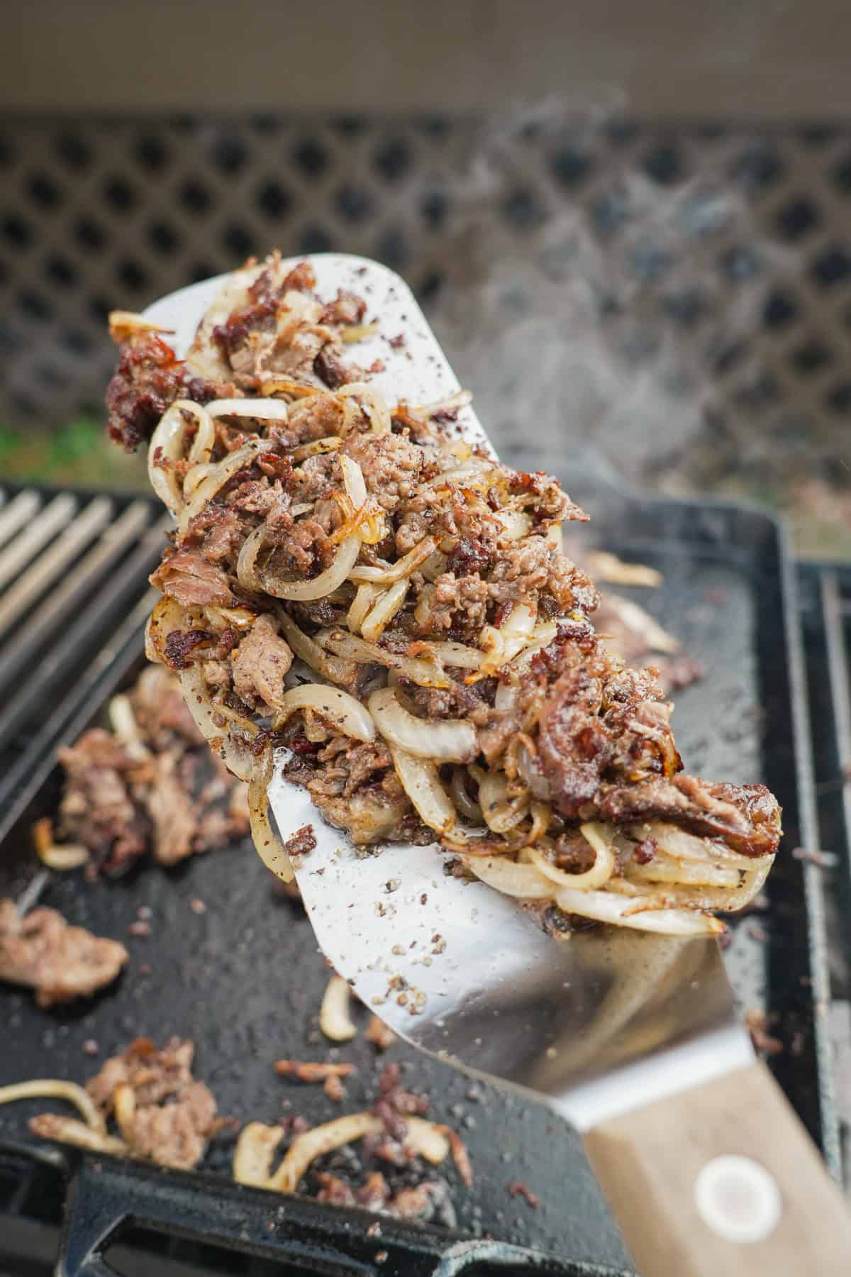 The Loaded Potato Skins filling is a mixture of your favorite steak and caramelized onions.