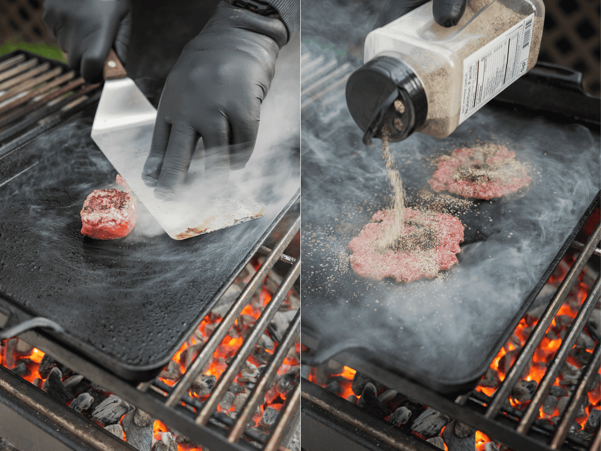 Gloved hands smashing beef patties with a heavy metal spatula and then seasoning with one of Derek Wolf's Spiceology rubs