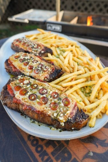 This dish is a showstopper. The beautiful steaks topped with marinara sauce, mozzarella, and pepperoni makes for a stunning plate of food.