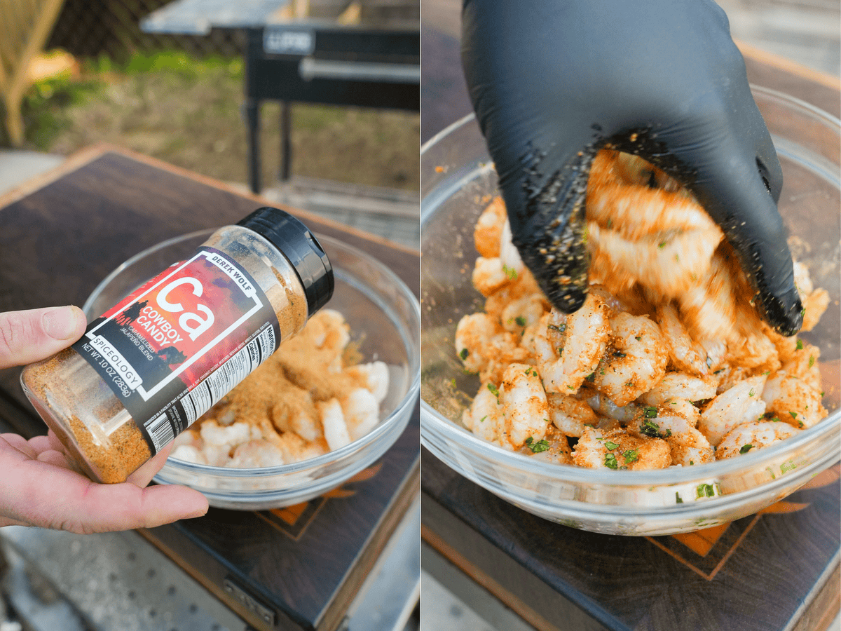 Seasoning raw shrimp with Cowboy Candy Seasoning and then a gloved hand mixing it together in a bowl