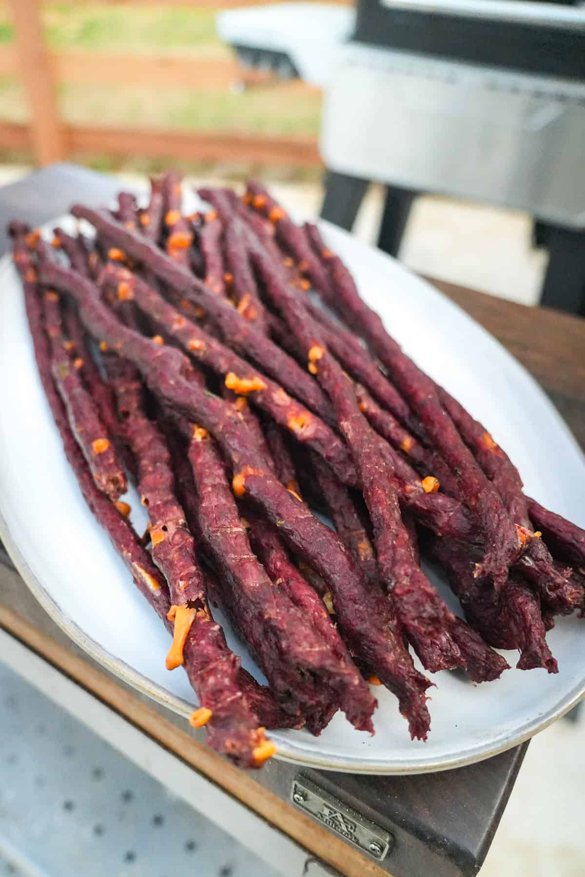 A plate full of jerky. 