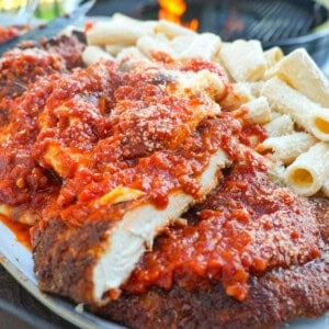 A close up of the Spicy Chicken Park, sliced into strips and served with pasta.