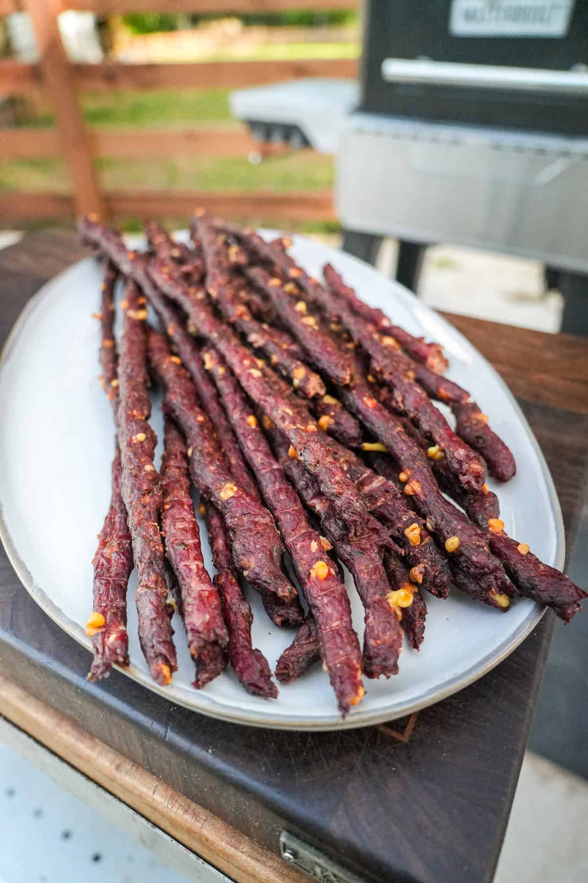 A plate of finished Texas Twinkie beef sticks