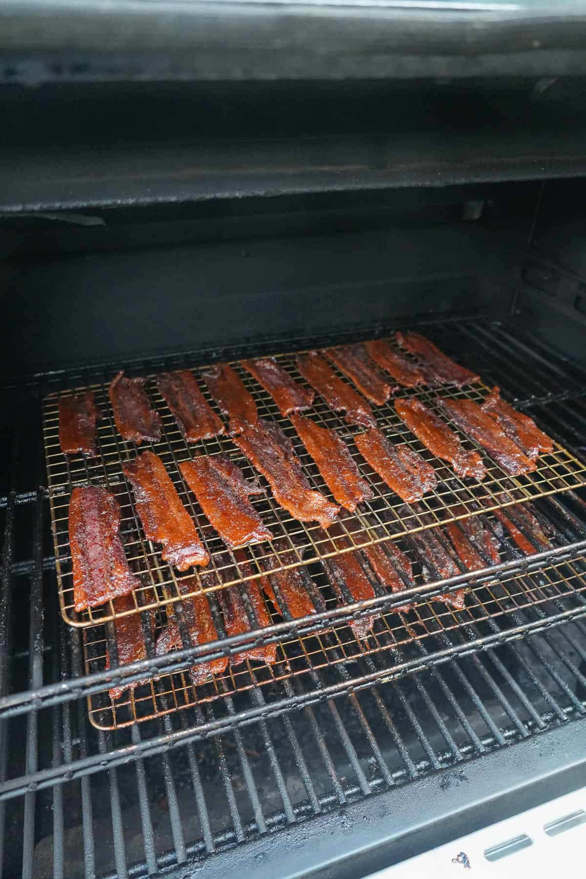 Smoked Bacon Jerky finishing up on the smoker.