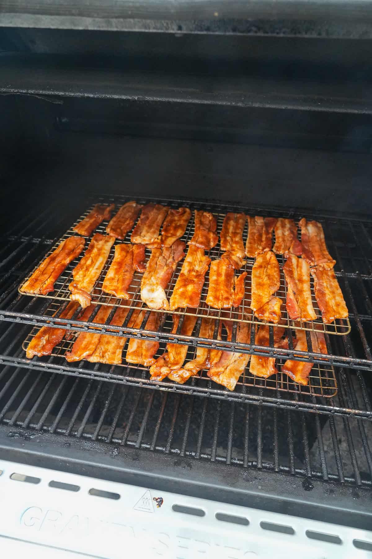 Getting things started on the smoker.