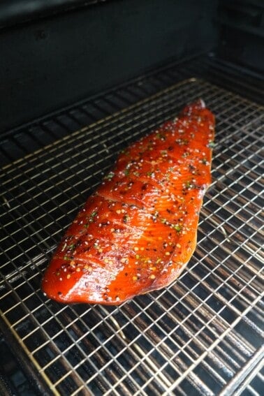 Close up of the Candied Salmon on the smoker, fully seasoned.