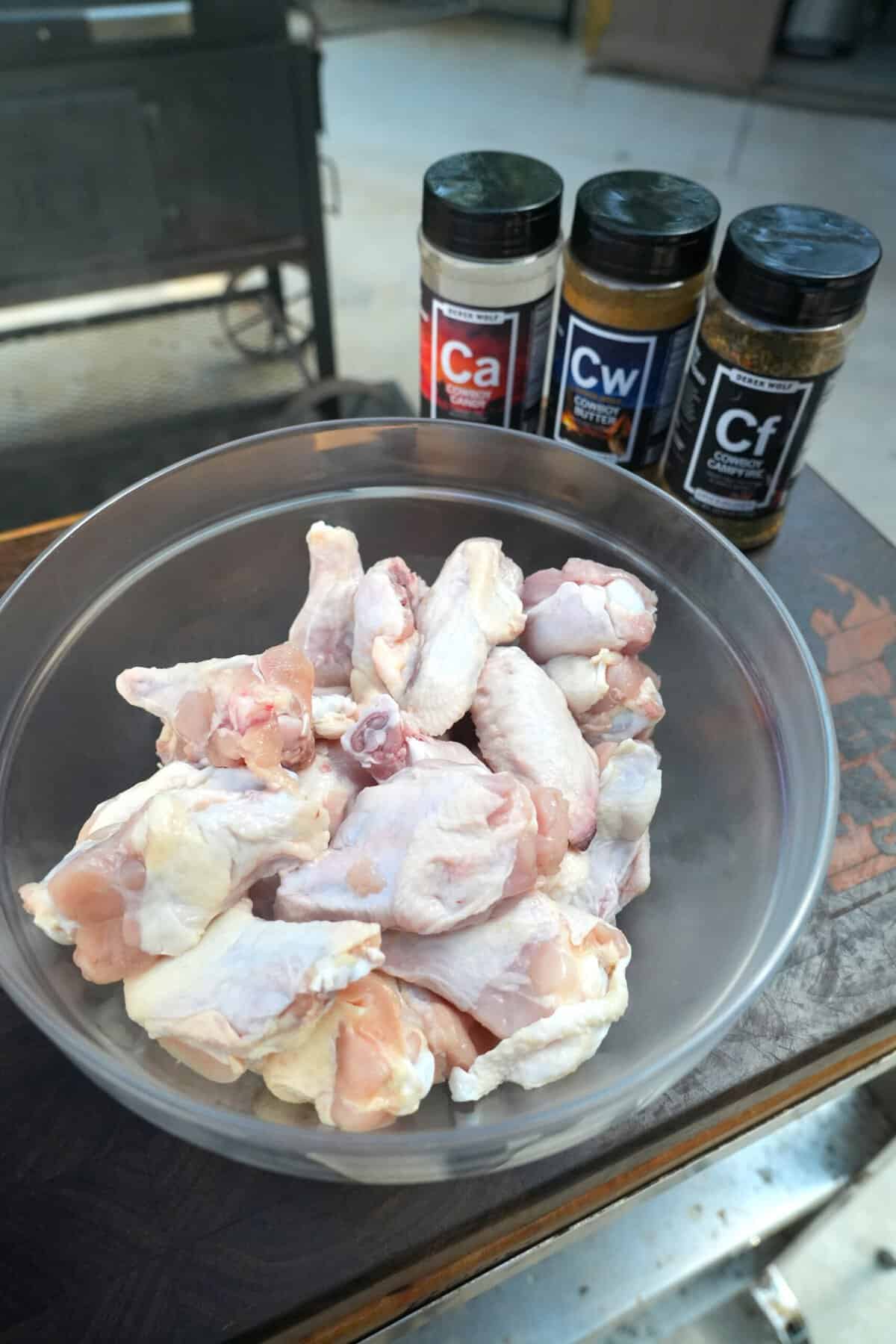 The chicken wings are seasoned with three of my signature Cowboy seasonings.