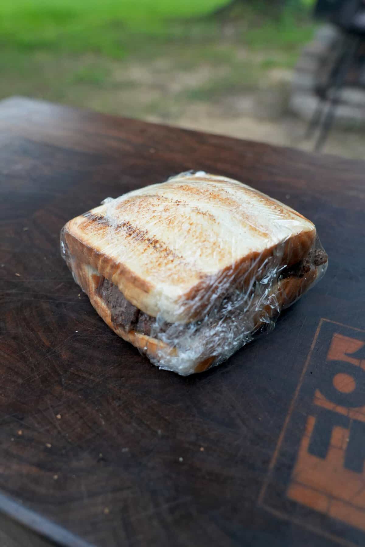 A wrapped steak sandwich is ready to go on your next adventure.