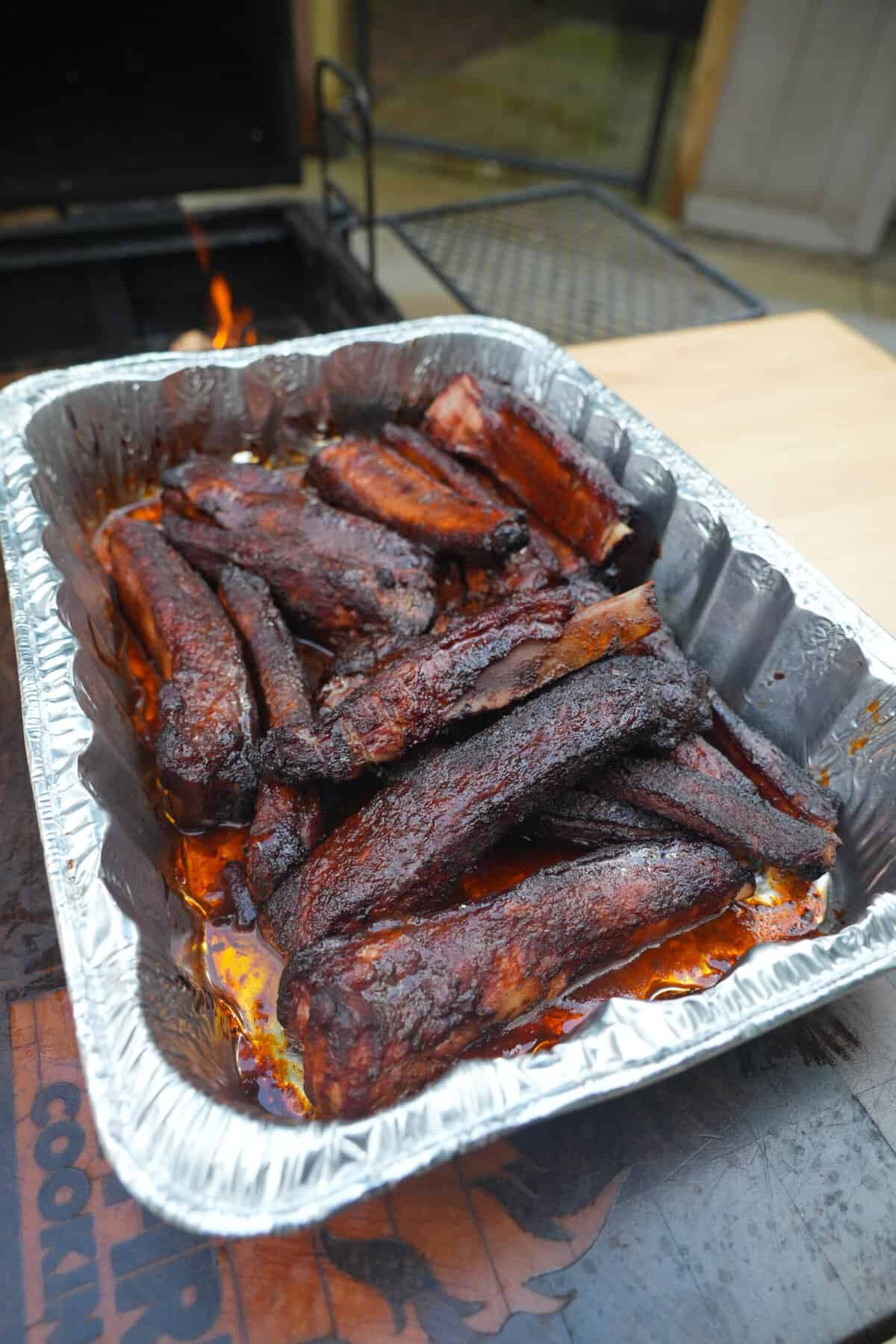 The ribs are done and covered in the tangy barbecue sauce packed with dill pickle flavor.