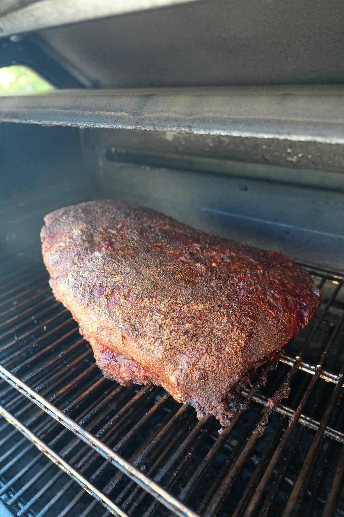 the packer brisket gets smoked low and slow in the smoker