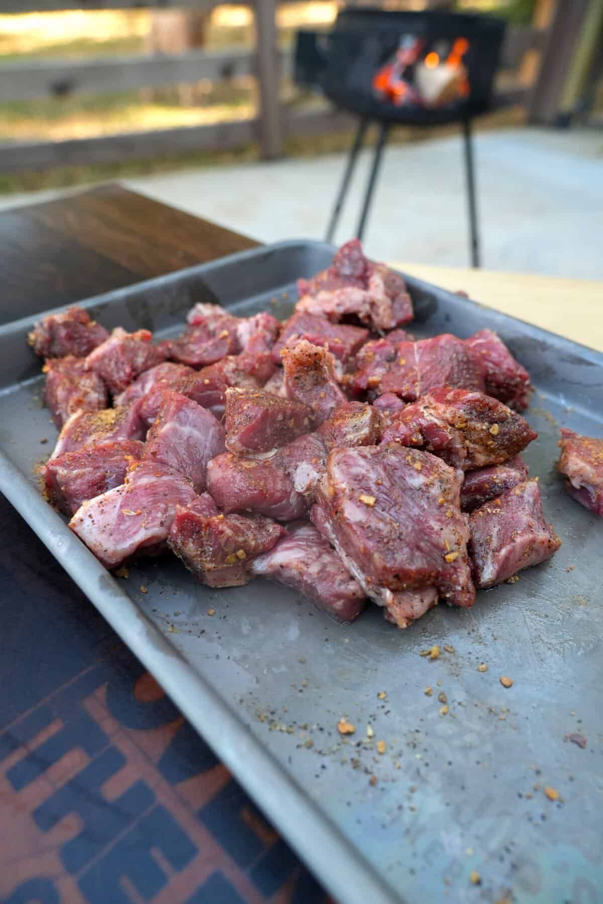 raw steak cubed is ready for the skillet.